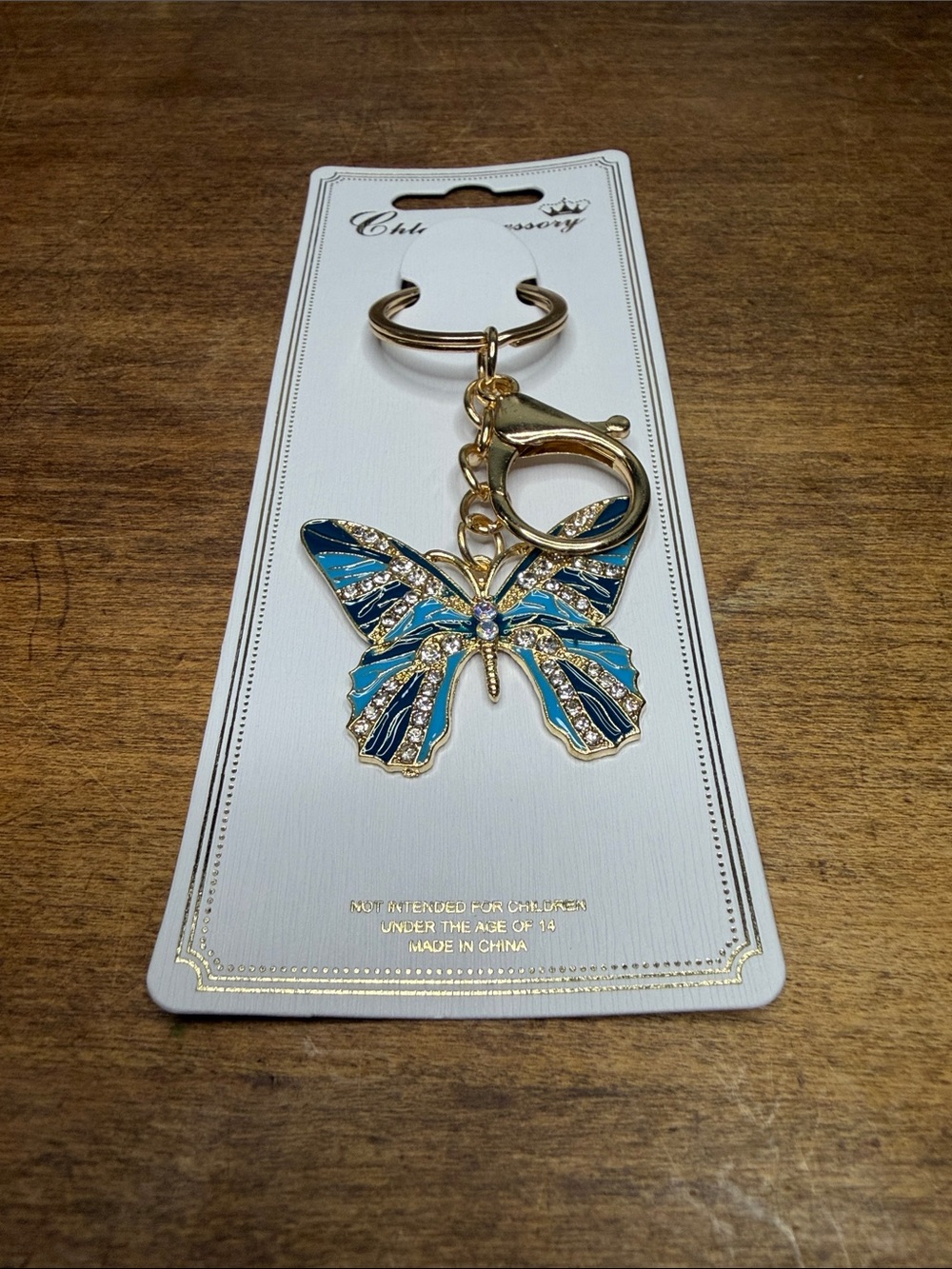 Gold Butterfly Keychain Bag Charm with Blue Accents